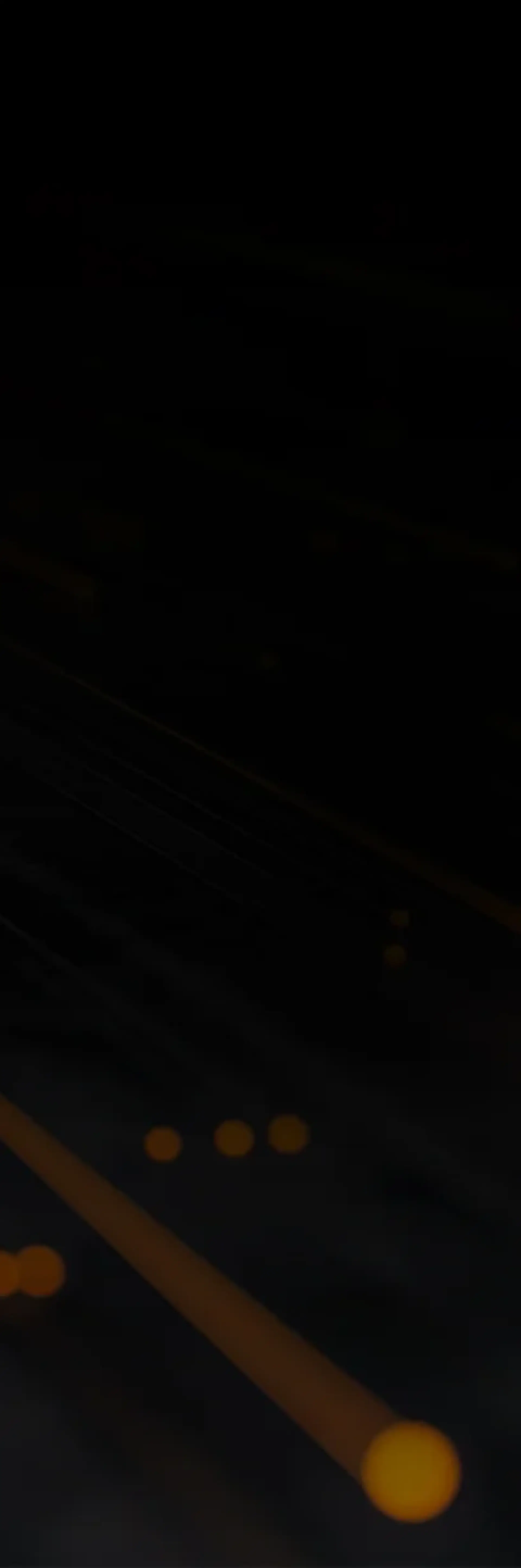 Schwarzes Bild mit orangenen Leuchteffekten Schwarzes Bild mit orangenen Leuchteffekten